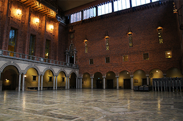 The Blue Hall of the Stockholm City Hall, the venue of the Nobel Banquet. Named the “Blue Hall” because initial plans called for the room to be painted blue, it was built with bricks instead