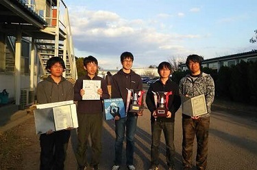 Members of the UTokyo Aviation Team with their certificates and trophies