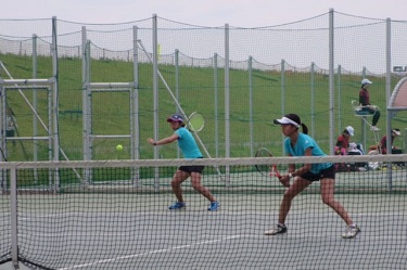 Women's tennis game (doubles)