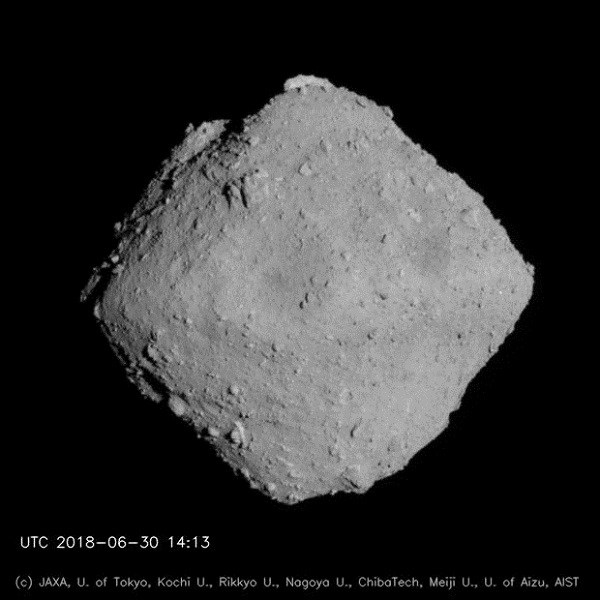 The asteroid Ryugu on a black background. 