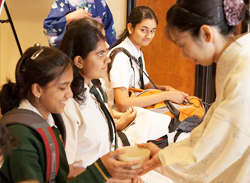 Students being served Japanese tea
