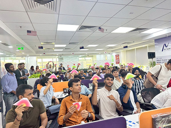 Participants taking part in the origami activity, creating Mount Fujis and shirts. The room was filled with excitement and warm energy.
