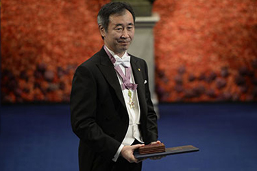 Physics Laureate Takaaki Kajita with his Nobel Medal and Diploma.<br>Copyright © Nobel Media AB 2015. Photo: Pi Frisk