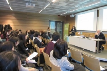 A student from the University of Tokyo giving a presentation at the symposium