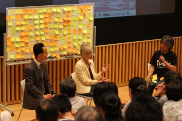 From left: Shinji Mukokyama, Lisa Randall, and Hitoshi Murayama address questions from the audience during their Q & A session