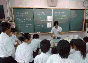 Children listening attentively to a student teaching their class