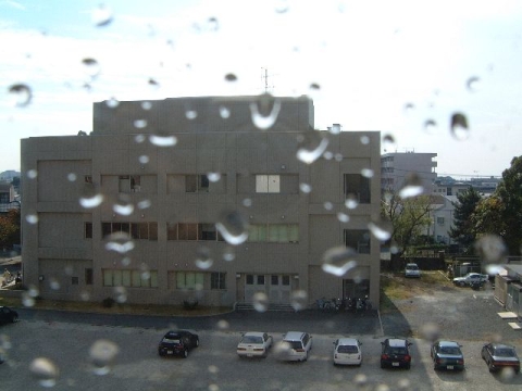 Fig. Camera lens with water droplets