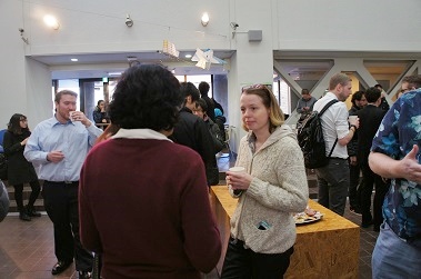 Ms. Rattan enjoying a conversation with Dr. Tasker during the coffee break