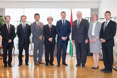 From left, ERI's Professor Hiroyuki Tanaka; Professor Hiroaki Aihara, University executive director and vice president; Mr. Noritaka Taguma, NEC's general manager for social safety domain; Professor Kazushige Obara, ERI director; Dr. Norbert Palanovics, ambassador of Hungary to Japan; Professor Peter Levai, Wigner’s director general; Dr. Györgyi Juhász, science and technology counsellor at the Hungarian Embassy; and Wigner's Dr. Dezso Varga