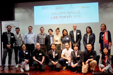 The 15 presenters at the Falling Walls Lab Tokyo 2018 pose for a group shot after the winners are announced.
