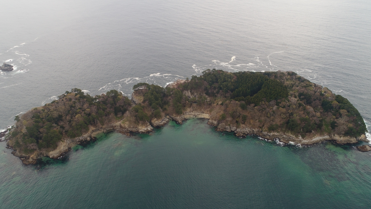 Bird's eye view of rugged, uninhabited island