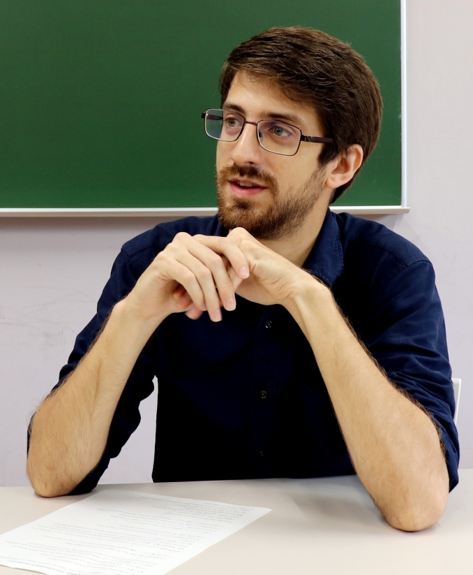 Student sitting and talking