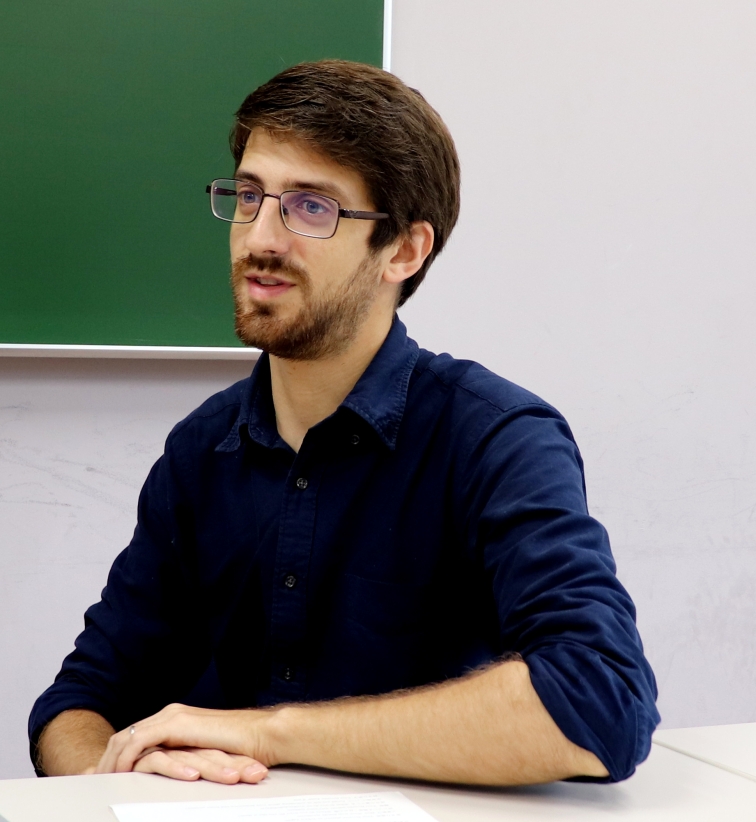 Student sitting and talking