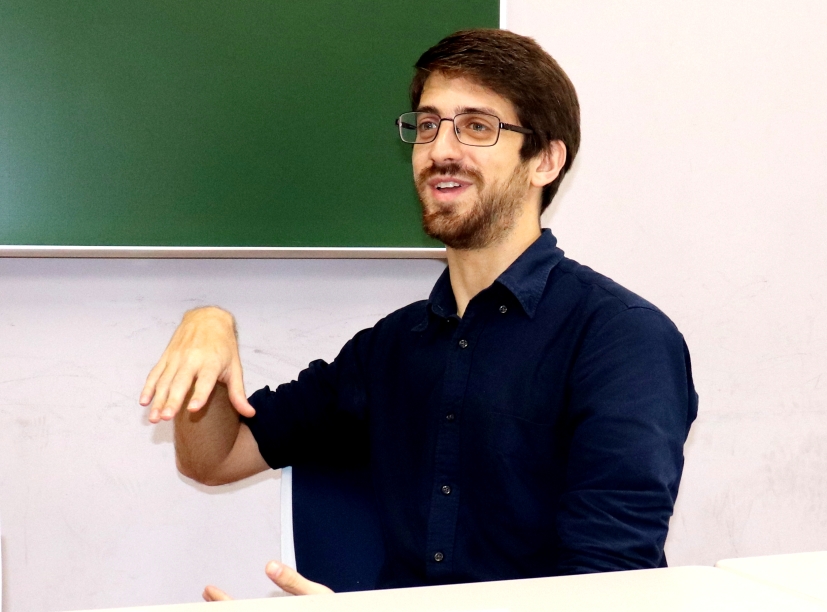 Student sitting and talking