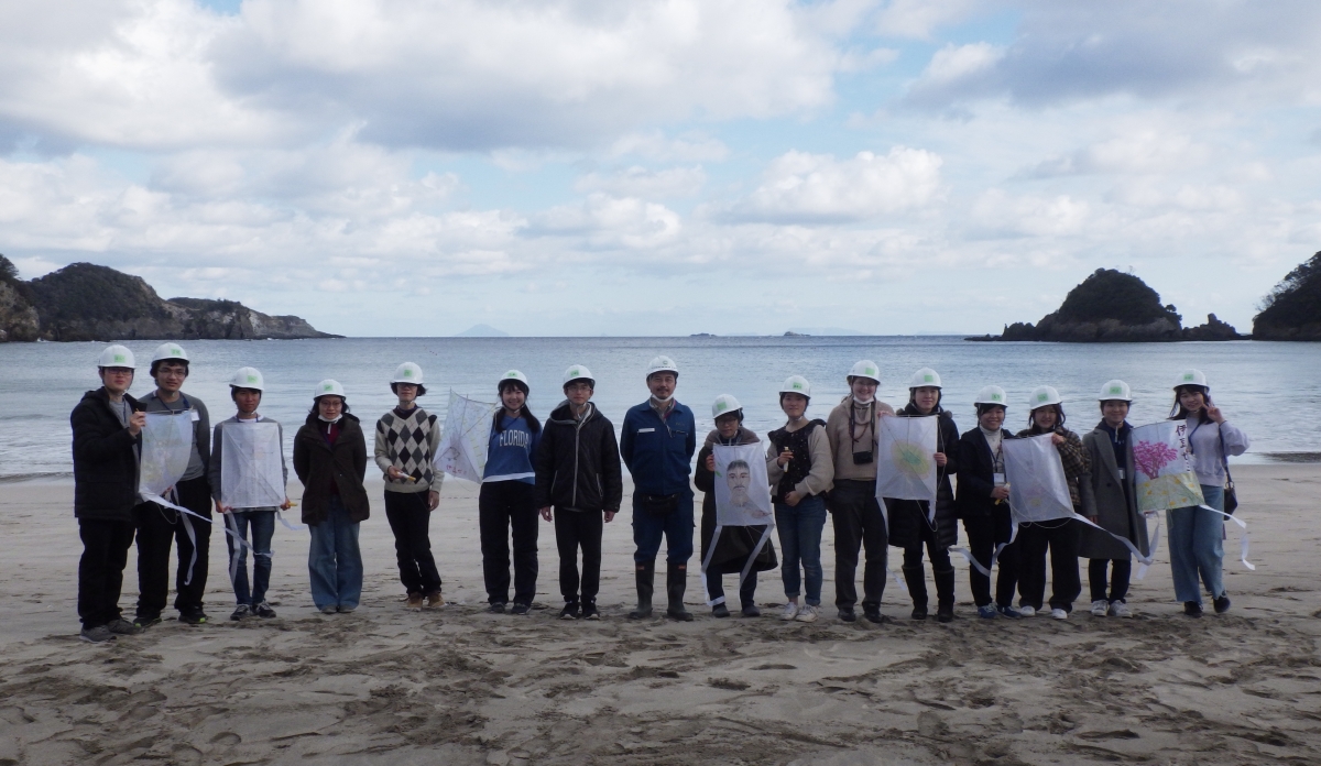 Group of people standing on a beach