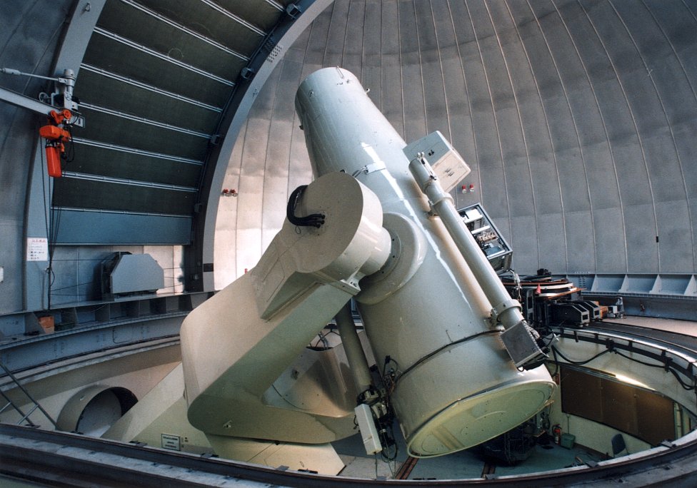 A photograph of a large white cylindrical telescope