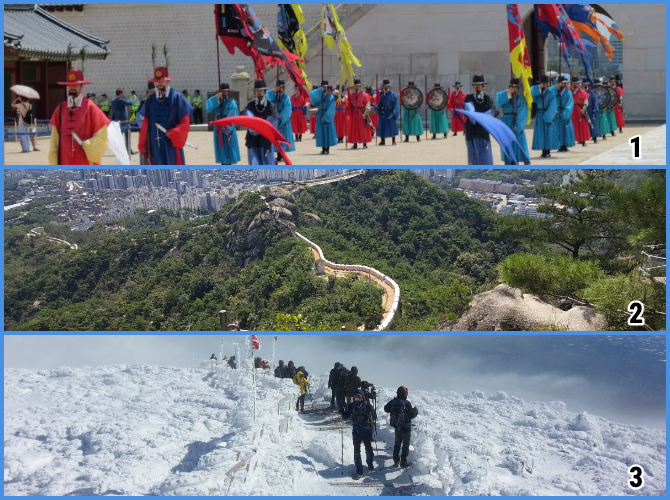 Men in colorful clothes standing, a wall outdoors surrounded by greenery, a snowy mountaintop