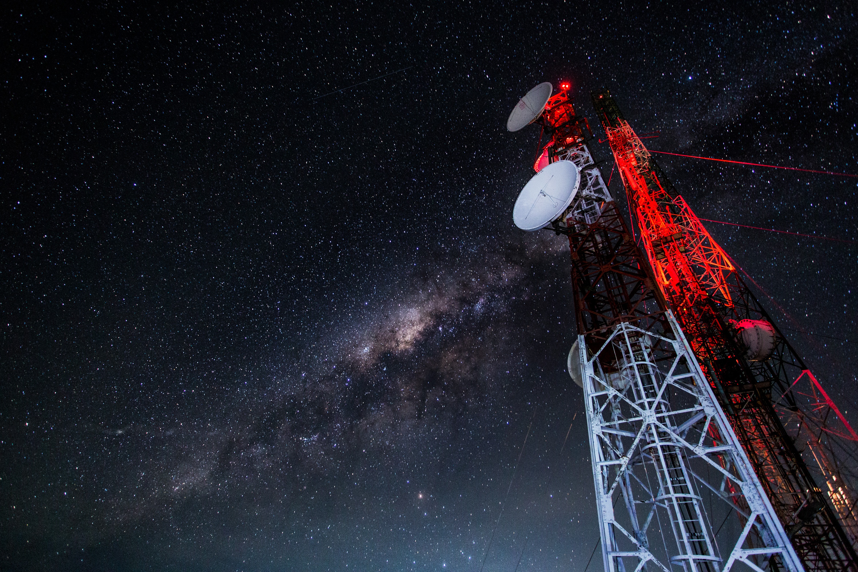 A telecommunication tower against a star field
