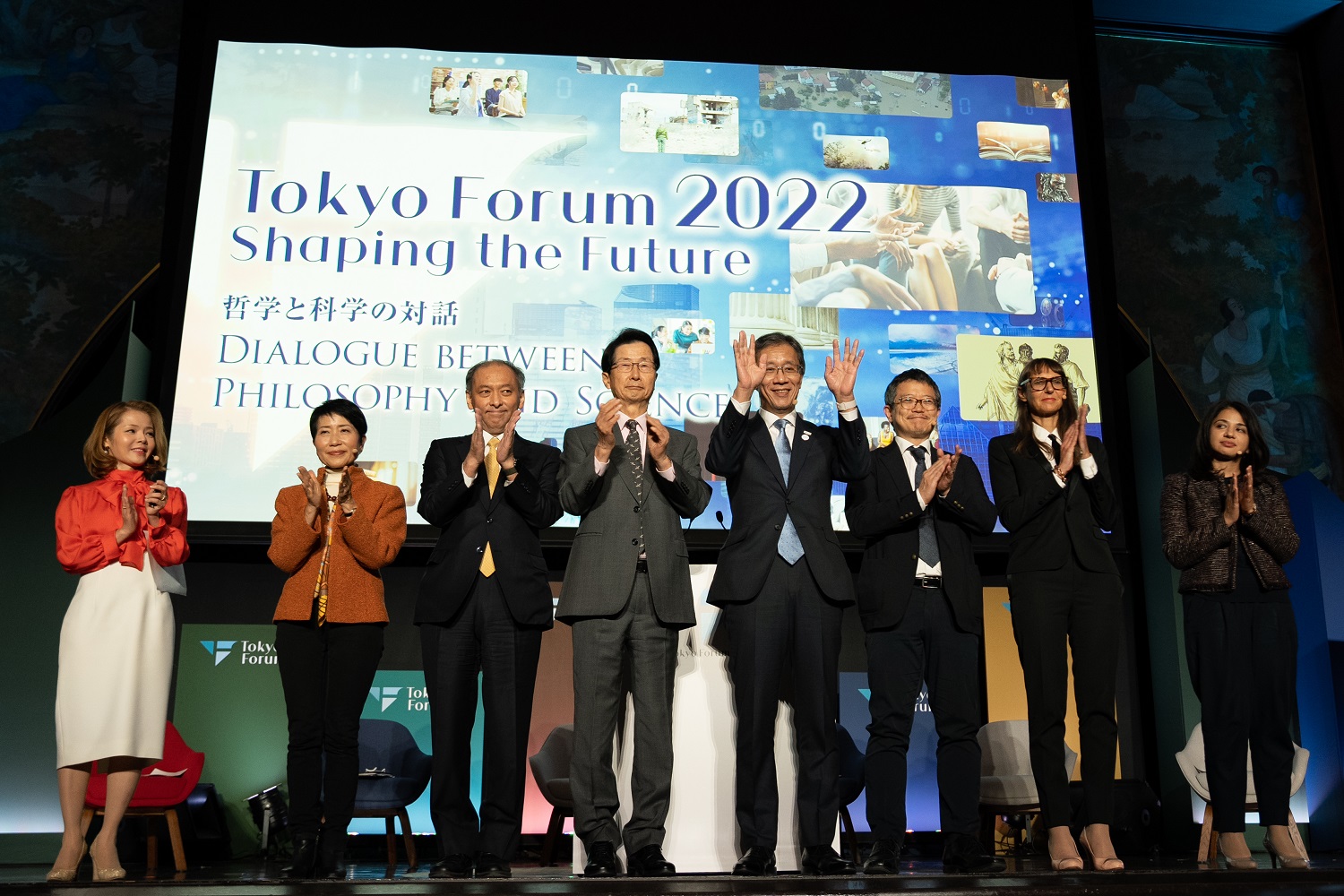 People standing on stage at Tokyo Forum 2022 closing