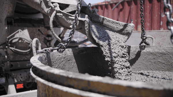 Gif of concrete being poured from a truck.