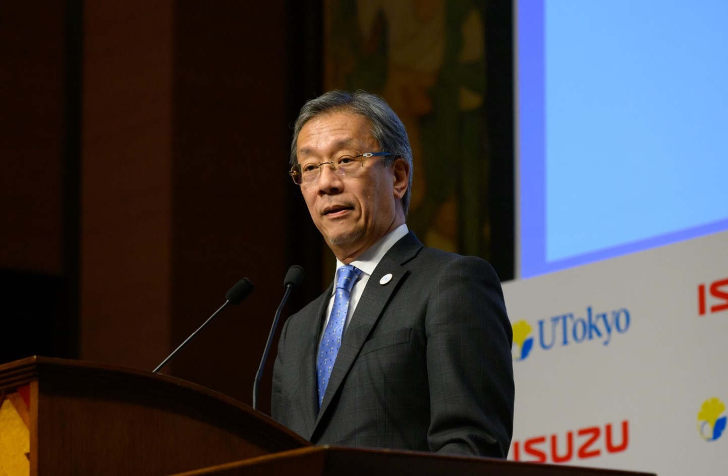 President Fujii delivers a speech